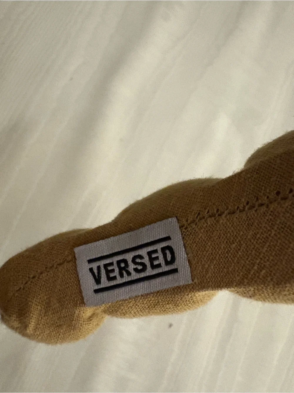 Versed croissant style tan linen headband
